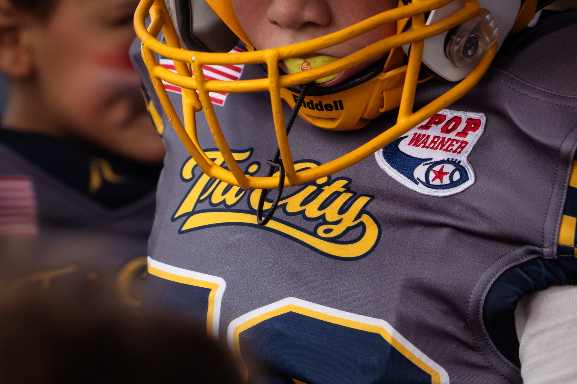 Pop Warner patch on a Tri-City football uniform